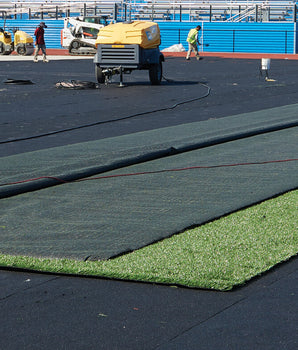 REGUPOL abzorb shock pad underlayment beneath a synthetic turf athletic field