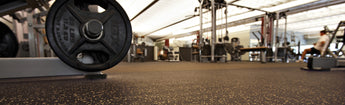 REGUPOL aktiv rolled rubber flooring installed in a commercial gym