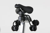 Patented Stages Weight Holder under saddle holding two 2 lb dumbbells